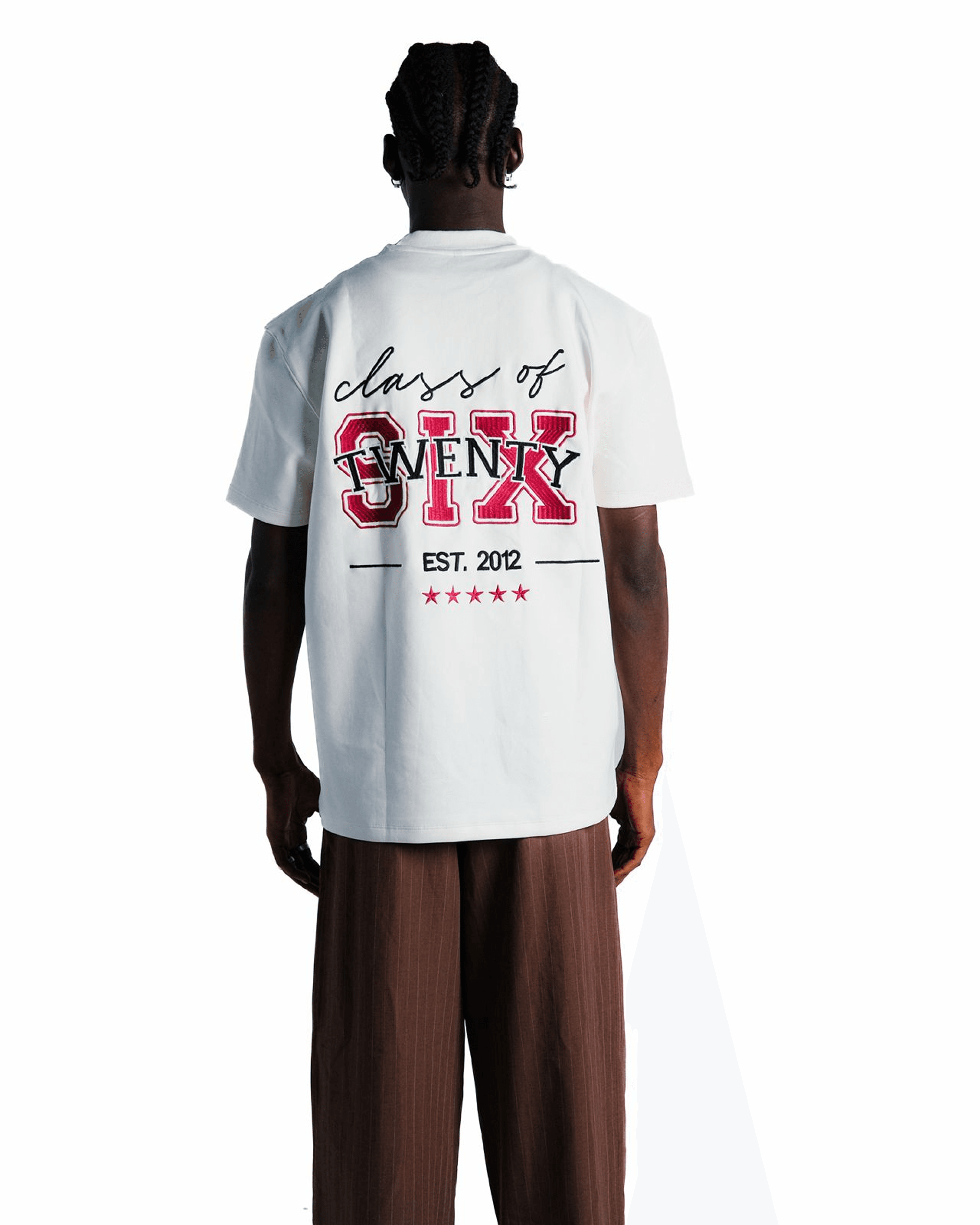 Back of a cream class-of-six tee with red varsity lettering